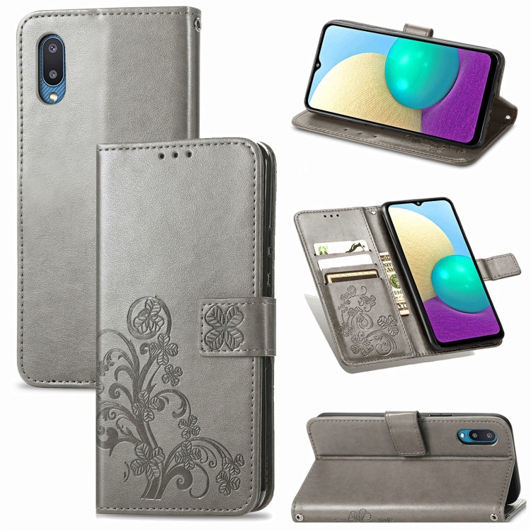 For Samsung Galaxy A02 Four-leaf Clasp Embossed Buckle Mobile Phone Protection Leather Case with Lanyard & Card Slot & Wallet & Bracket Function