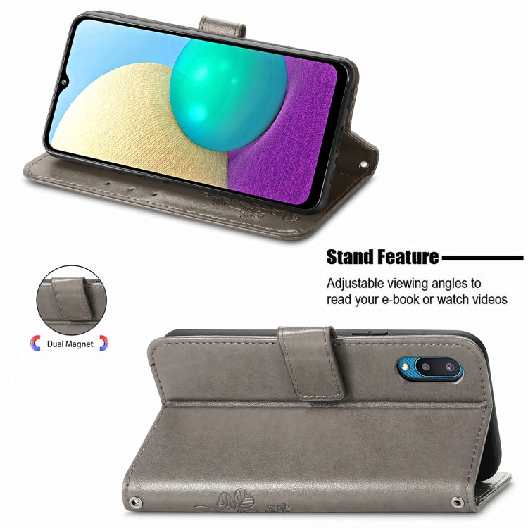 For Samsung Galaxy A02 Four-leaf Clasp Embossed Buckle Mobile Phone Protection Leather Case with Lanyard & Card Slot & Wallet & Bracket Function