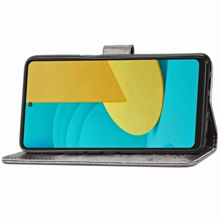 For LG Stylo 7 Four-leaf Clasp Embossed Buckle Mobile Phone Protection Leather Case with Lanyard & Card Slot & Wallet & Bracket Function