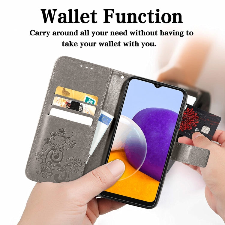 For Samsung Galaxy A22 5G Four-leaf Clasp Embossed Buckle Mobile Phone Protection Leather Case with Lanyard & Card Slot & Wallet & Bracket Function