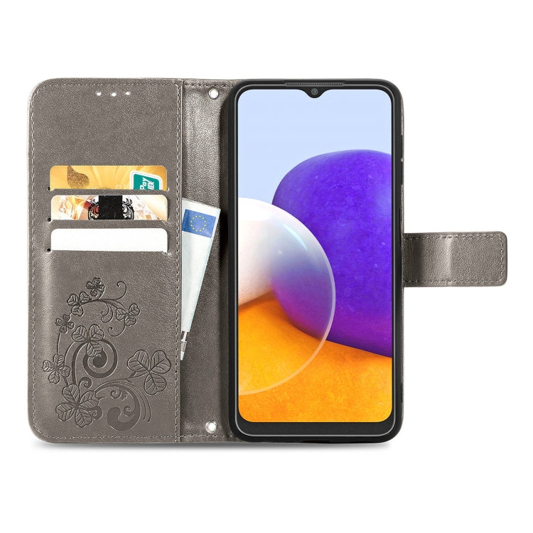 For Samsung Galaxy A22 4G Four-leaf Clasp Embossed Buckle Mobile Phone Protection Leather Case with Lanyard & Card Slot & Wallet & Bracket Function