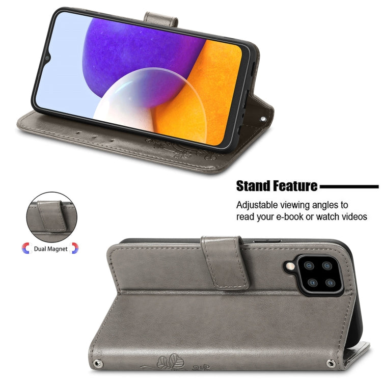 For Samsung Galaxy A22 4G Four-leaf Clasp Embossed Buckle Mobile Phone Protection Leather Case with Lanyard & Card Slot & Wallet & Bracket Function