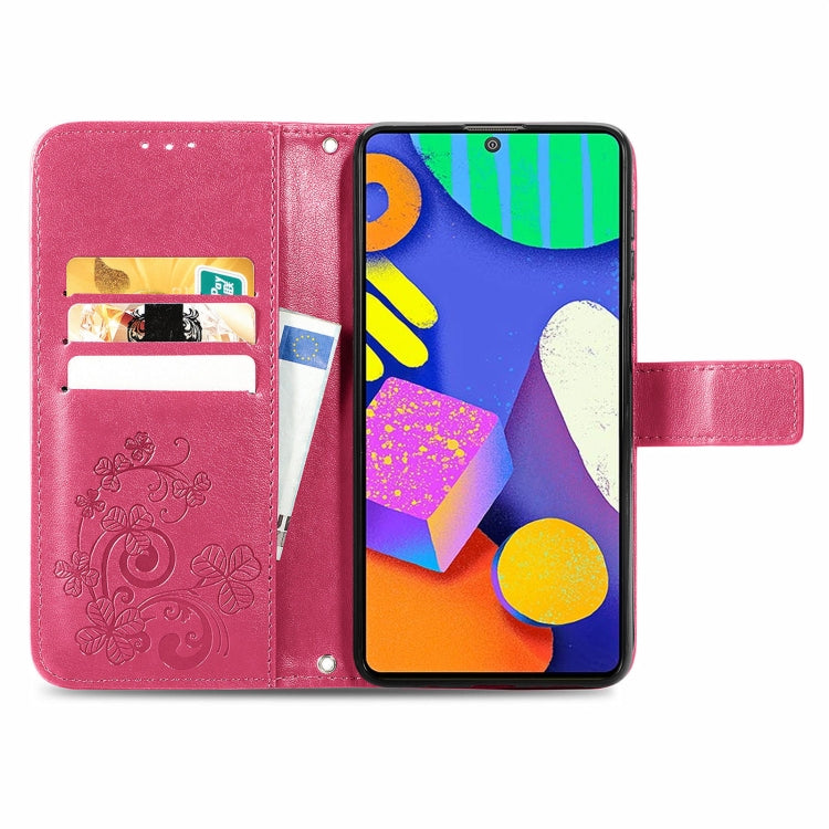 For Samsung Galaxy F62/M62 Four-leaf Clasp Embossed Buckle Mobile Phone Protection Leather Case with Lanyard & Card Slot & Wallet & Bracket Function