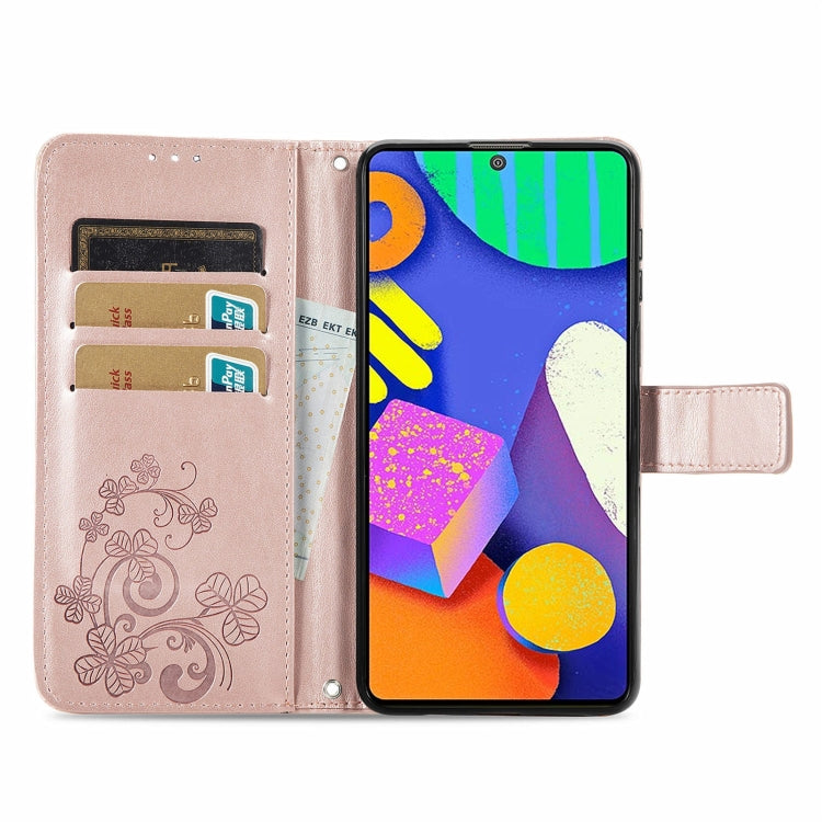 For Samsung Galaxy F62/M62 Four-leaf Clasp Embossed Buckle Mobile Phone Protection Leather Case with Lanyard & Card Slot & Wallet & Bracket Function