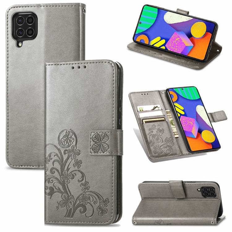 For Samsung Galaxy F62/M62 Four-leaf Clasp Embossed Buckle Mobile Phone Protection Leather Case with Lanyard & Card Slot & Wallet & Bracket Function