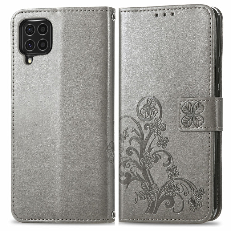 For Samsung Galaxy F62/M62 Four-leaf Clasp Embossed Buckle Mobile Phone Protection Leather Case with Lanyard & Card Slot & Wallet & Bracket Function
