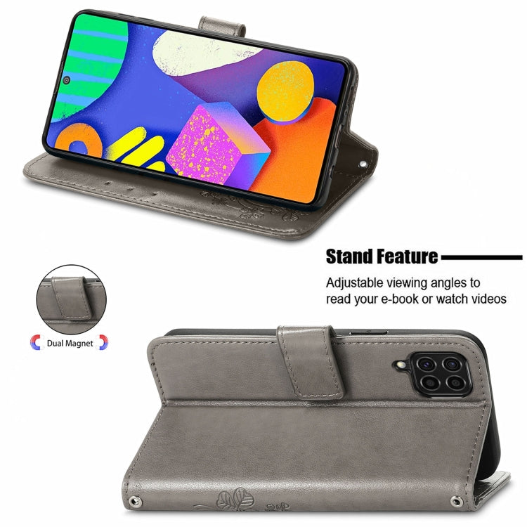 For Samsung Galaxy F62/M62 Four-leaf Clasp Embossed Buckle Mobile Phone Protection Leather Case with Lanyard & Card Slot & Wallet & Bracket Function