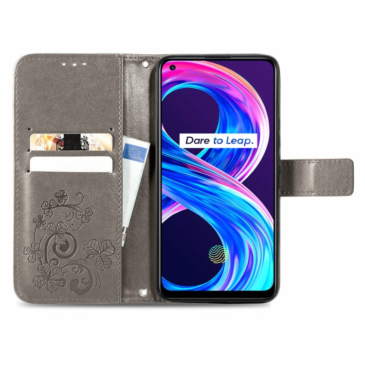 For OPPO Realme 8 5G / Realme V13 5G Four-leaf Clasp Embossed Buckle Mobile Phone Protection Leather Case with Lanyard & Card Slot & Wallet & Bracket Function