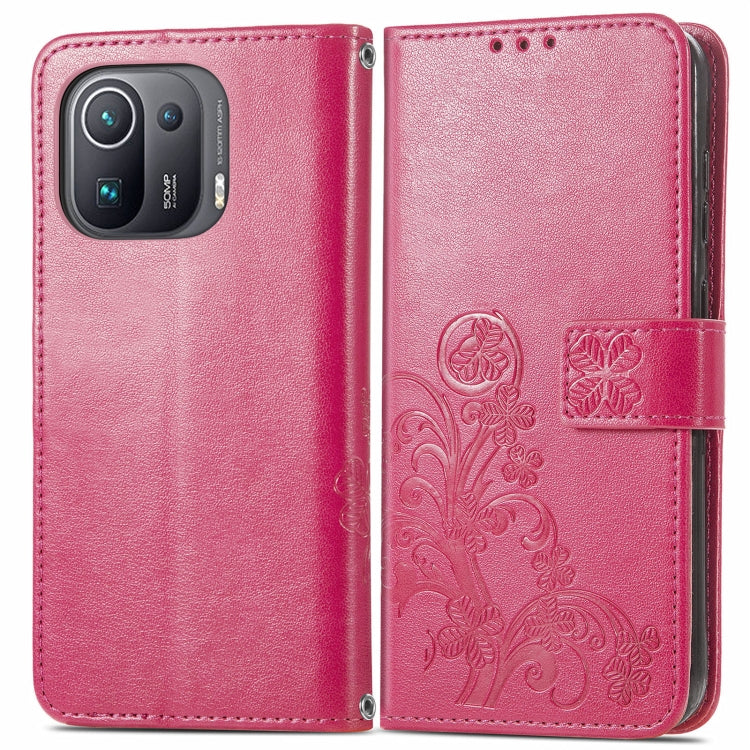 For Xiaomi Mi 11 Pro Four-leaf Clasp Embossed Buckle Mobile Phone Protection Leather Case with Lanyard & Card Slot & Wallet & Bracket Function
