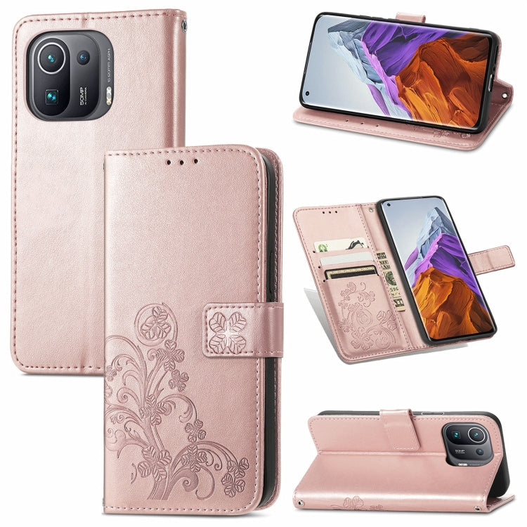 For Xiaomi Mi 11 Pro Four-leaf Clasp Embossed Buckle Mobile Phone Protection Leather Case with Lanyard & Card Slot & Wallet & Bracket Function