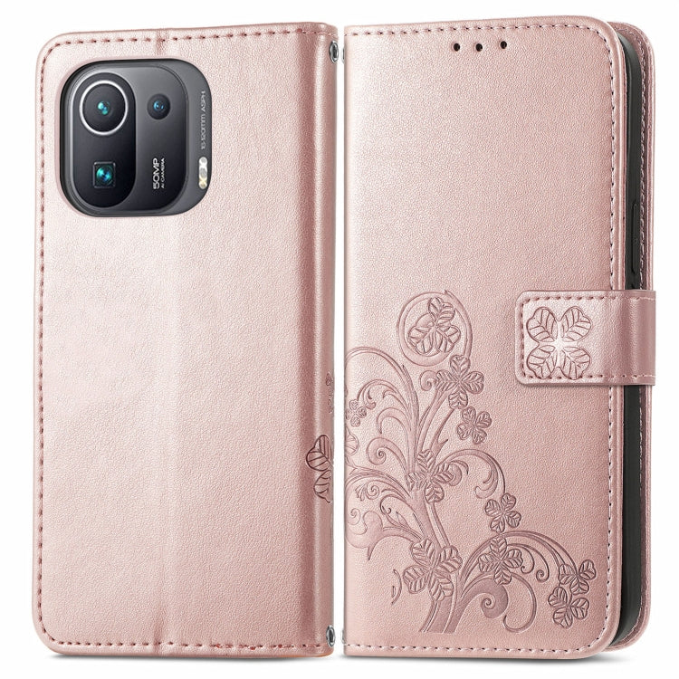 For Xiaomi Mi 11 Pro Four-leaf Clasp Embossed Buckle Mobile Phone Protection Leather Case with Lanyard & Card Slot & Wallet & Bracket Function