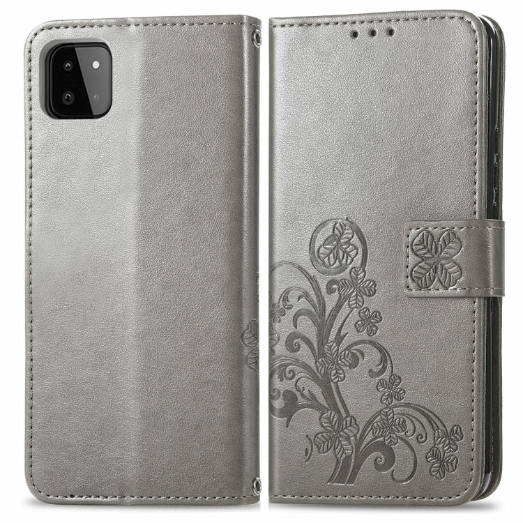 For Samsung Galaxy A22 5G Four-leaf Clasp Embossed Buckle Mobile Phone Protection Leather Case with Lanyard & Card Slot & Wallet & Bracket Function
