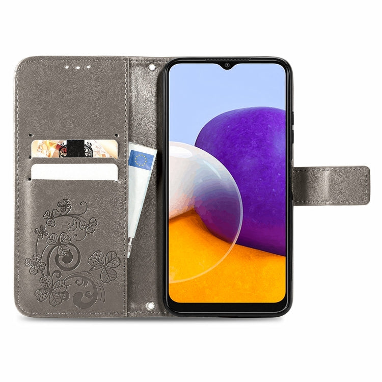 For Samsung Galaxy A22 5G Four-leaf Clasp Embossed Buckle Mobile Phone Protection Leather Case with Lanyard & Card Slot & Wallet & Bracket Function