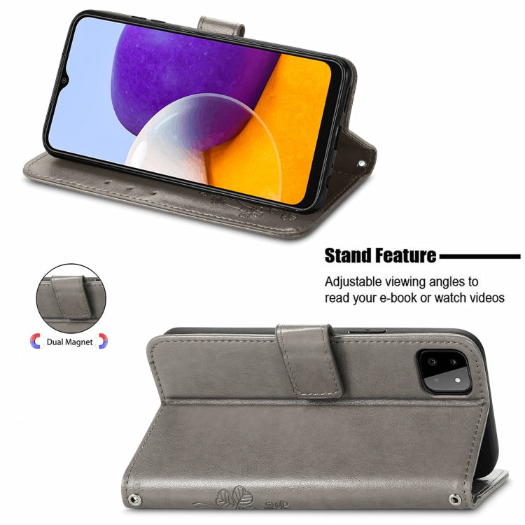 For Samsung Galaxy A22 5G Four-leaf Clasp Embossed Buckle Mobile Phone Protection Leather Case with Lanyard & Card Slot & Wallet & Bracket Function
