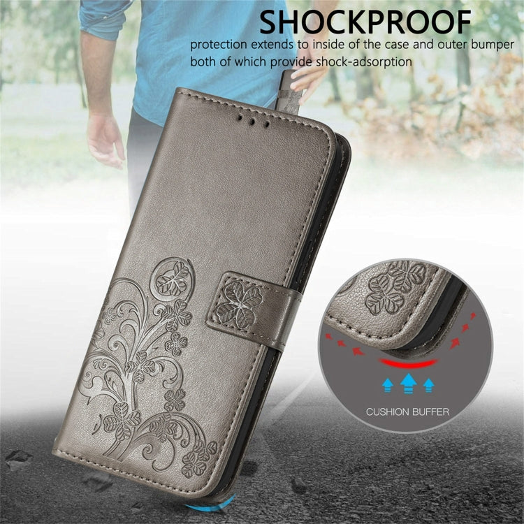 For Samsung Galaxy A22 5G Four-leaf Clasp Embossed Buckle Mobile Phone Protection Leather Case with Lanyard & Card Slot & Wallet & Bracket Function