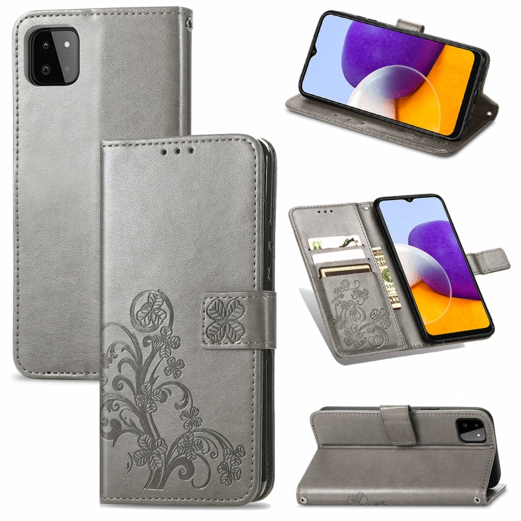 For Samsung Galaxy A22 4G Four-leaf Clasp Embossed Buckle Mobile Phone Protection Leather Case with Lanyard & Card Slot & Wallet & Bracket Function