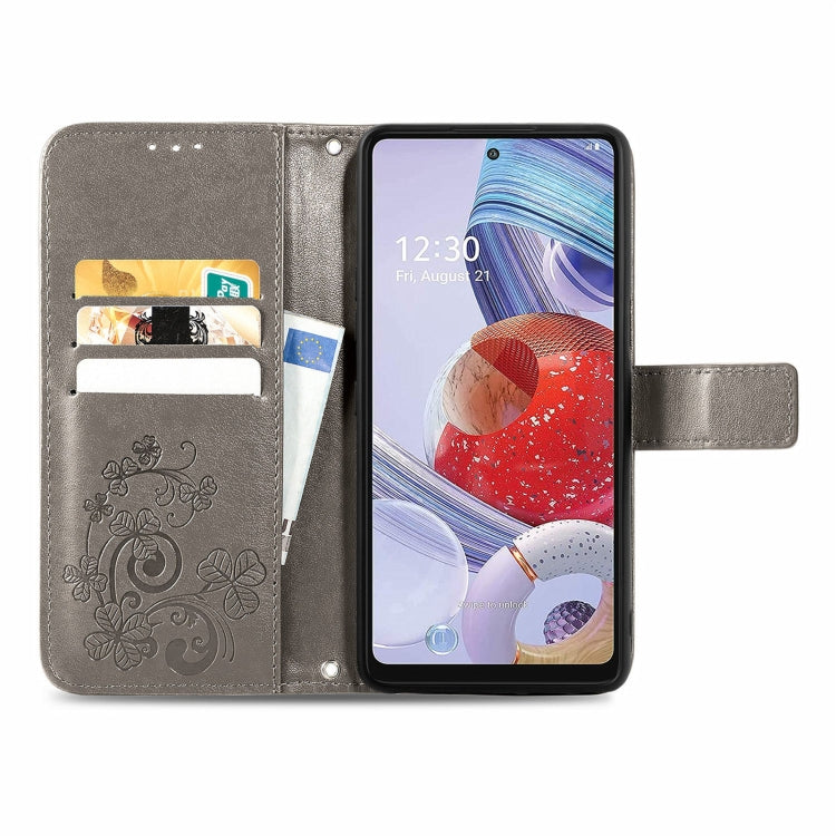 For LG Stylo 7 4G Four-leaf Clasp Embossed Buckle Mobile Phone Protection Leather Case with Lanyard & Card Slot & Wallet & Bracket Function