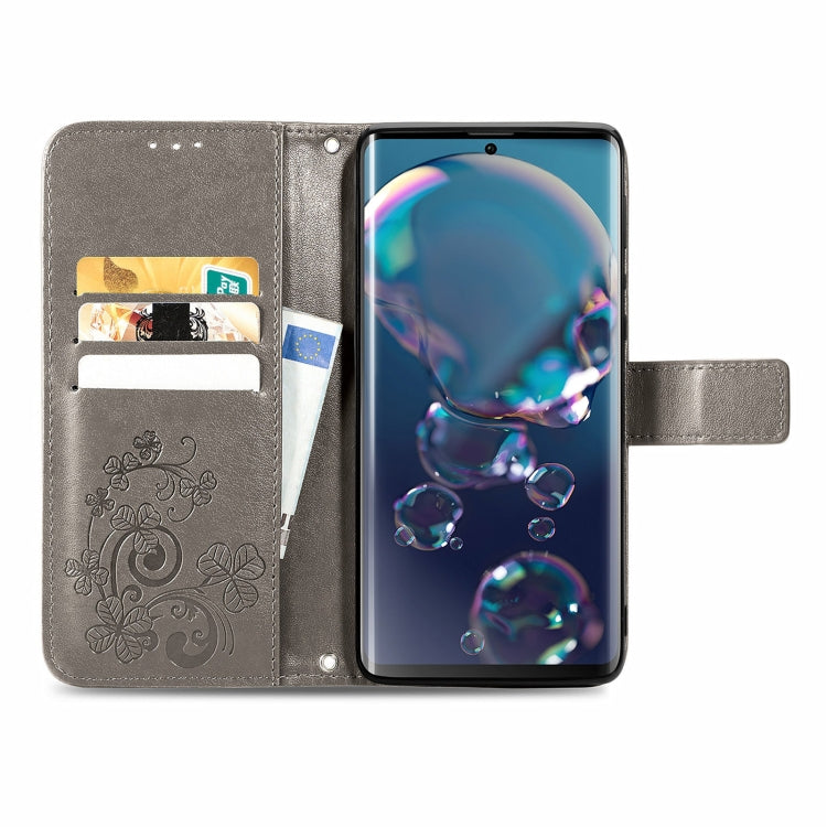 For Sharp R6 Four-leaf Clasp Embossed Buckle Mobile Phone Protection Leather Case with Lanyard & Card Slot & Wallet & Bracket Function