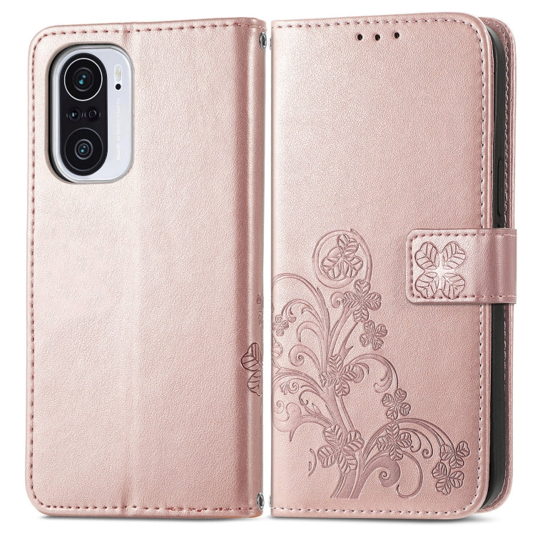 For Xiaomi Redmi K40 / K40 Pro Four-leaf Clasp Embossed Buckle Mobile Phone Protection Leather Case with Lanyard & Card Slot & Wallet & Bracket Function