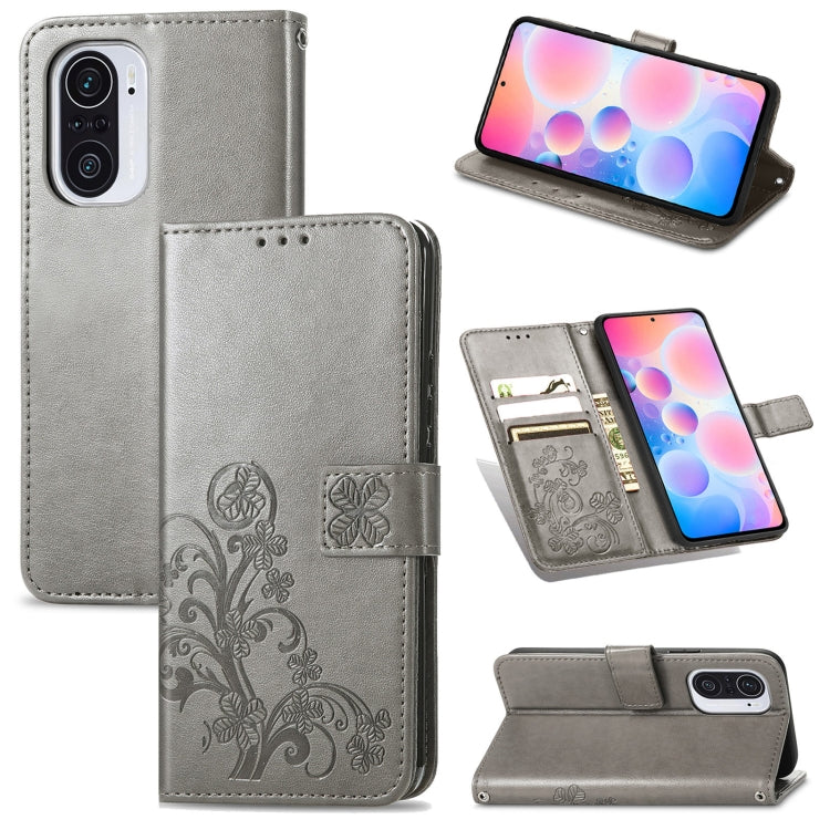 For Xiaomi Redmi K40 / K40 Pro Four-leaf Clasp Embossed Buckle Mobile Phone Protection Leather Case with Lanyard & Card Slot & Wallet & Bracket Function