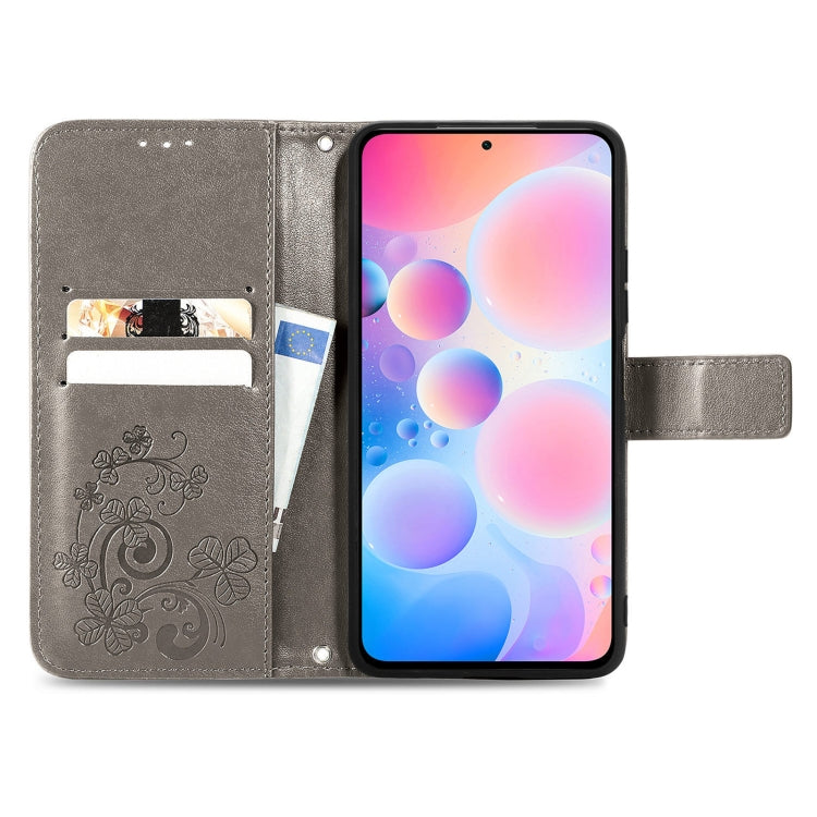 For Xiaomi Redmi K40 / K40 Pro Four-leaf Clasp Embossed Buckle Mobile Phone Protection Leather Case with Lanyard & Card Slot & Wallet & Bracket Function