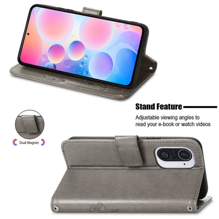 For Xiaomi Redmi K40 / K40 Pro Four-leaf Clasp Embossed Buckle Mobile Phone Protection Leather Case with Lanyard & Card Slot & Wallet & Bracket Function
