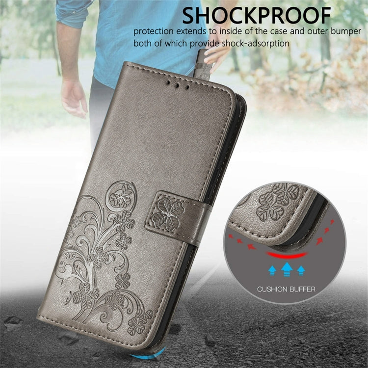 For Xiaomi Redmi K40 / K40 Pro Four-leaf Clasp Embossed Buckle Mobile Phone Protection Leather Case with Lanyard & Card Slot & Wallet & Bracket Function