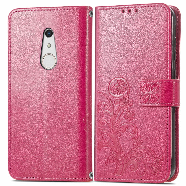 For FUJITSU F-41B Four-leaf Clasp Embossed Buckle Mobile Phone Protection Leather Case with Lanyard & Card Slot & Wallet & Bracket Function