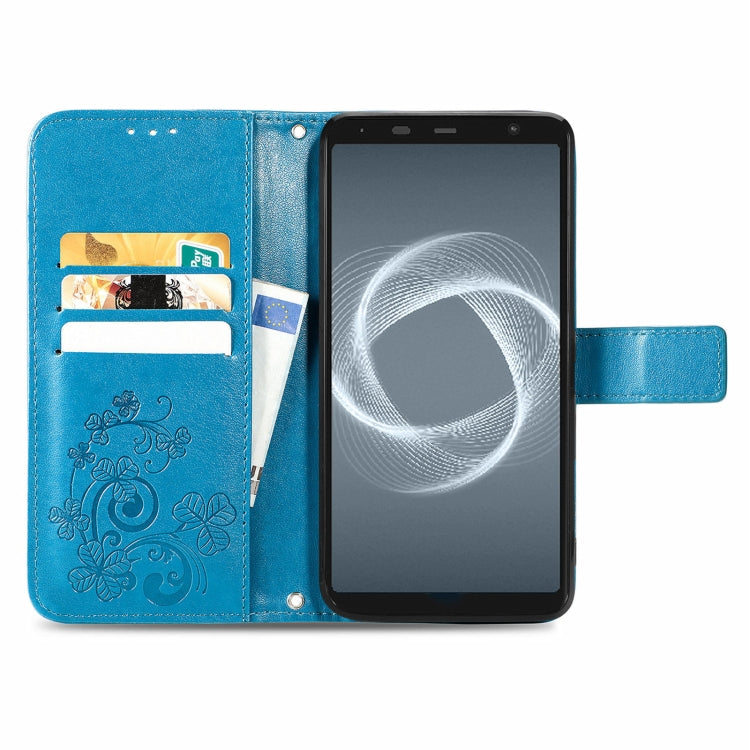 For FUJITSU F-41B Four-leaf Clasp Embossed Buckle Mobile Phone Protection Leather Case with Lanyard & Card Slot & Wallet & Bracket Function