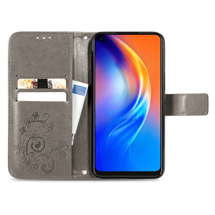 For Tecno Spark 6 Four-leaf Clasp Embossed Buckle Mobile Phone Protection Leather Case with Lanyard & Card Slot & Wallet & Bracket Function