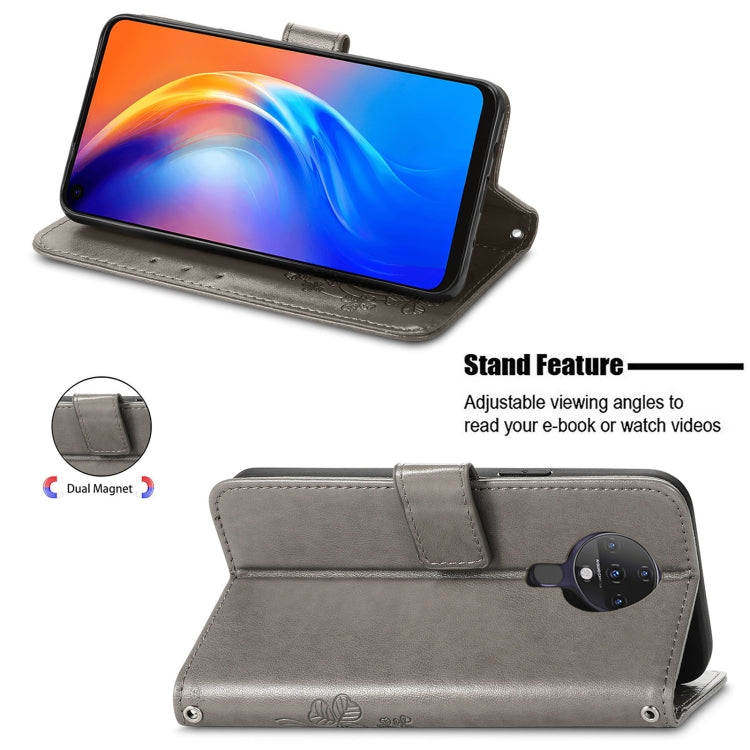 For Tecno Spark 6 Four-leaf Clasp Embossed Buckle Mobile Phone Protection Leather Case with Lanyard & Card Slot & Wallet & Bracket Function