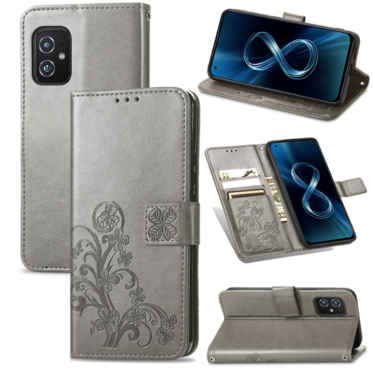 For Asus Zenfone 8 ZS590KS Four-leaf Clasp Embossed Buckle Mobile Phone Protection Leather Case with Lanyard & Card Slot & Wallet & Bracket Function