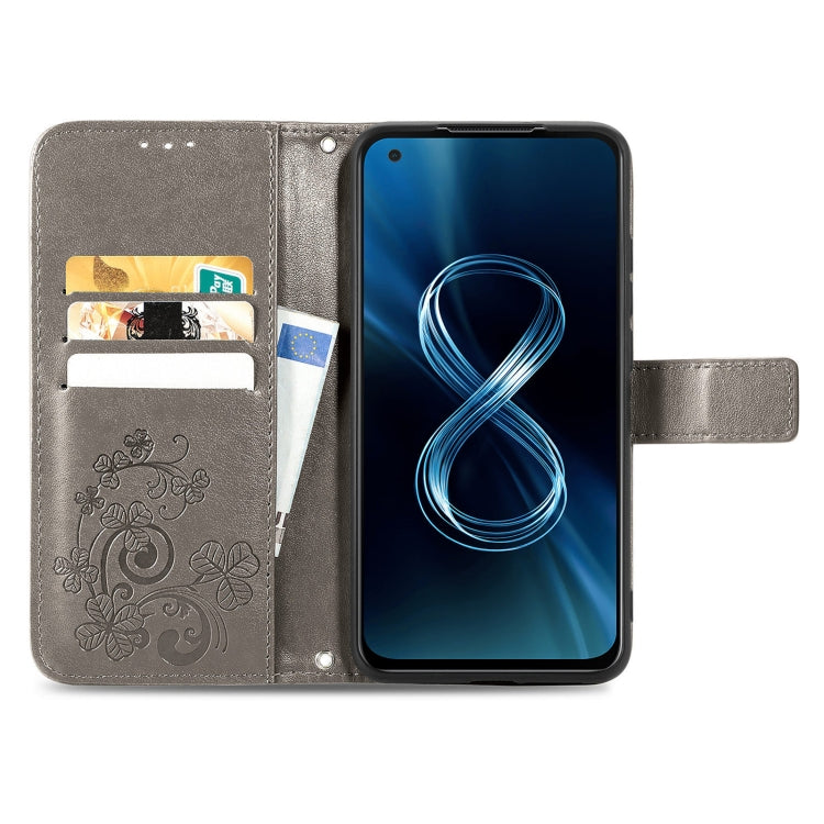 For Asus Zenfone 8 ZS590KS Four-leaf Clasp Embossed Buckle Mobile Phone Protection Leather Case with Lanyard & Card Slot & Wallet & Bracket Function