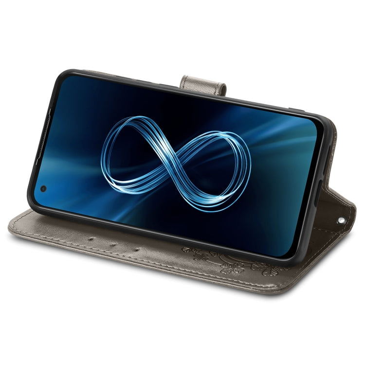 For Asus Zenfone 8 ZS590KS Four-leaf Clasp Embossed Buckle Mobile Phone Protection Leather Case with Lanyard & Card Slot & Wallet & Bracket Function