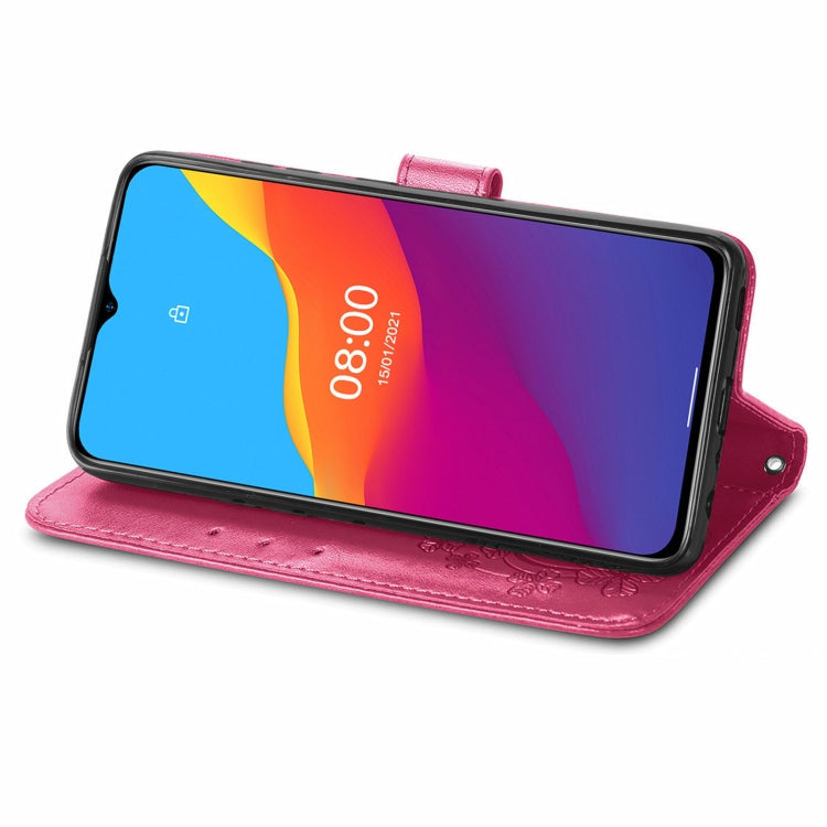 For Ulefone Note 10 Four-leaf Clasp Embossed Buckle Mobile Phone Protection Leather Case with Lanyard & Card Slot & Wallet & Bracket Function