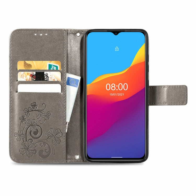 For Ulefone Note 10 Four-leaf Clasp Embossed Buckle Mobile Phone Protection Leather Case with Lanyard & Card Slot & Wallet & Bracket Function