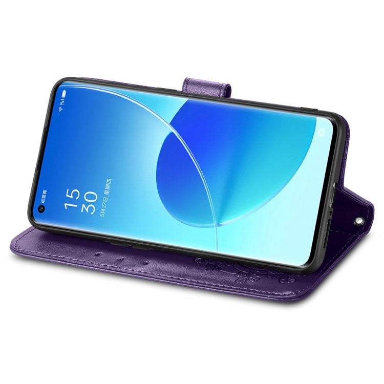 For OPPO Reno6 Pro+ Four-leaf Clasp Embossed Buckle Mobile Phone Protection Leather Case with Lanyard & Card Slot & Wallet & Bracket Function