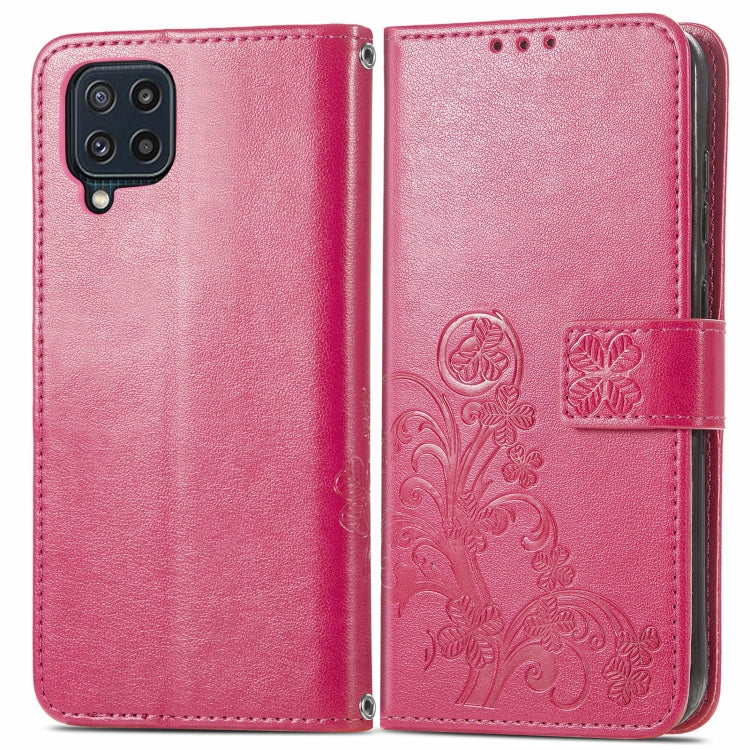 For Samsung Galaxy M32 Four-leaf Clasp Embossed Buckle Mobile Phone Protection Leather Case with Lanyard & Card Slot & Wallet & Bracket Function