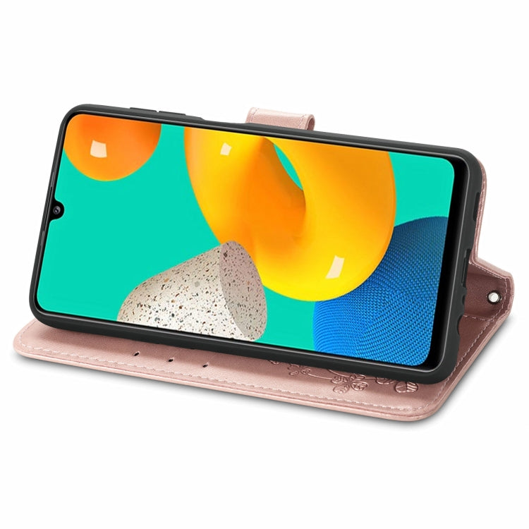 For Samsung Galaxy M32 Four-leaf Clasp Embossed Buckle Mobile Phone Protection Leather Case with Lanyard & Card Slot & Wallet & Bracket Function