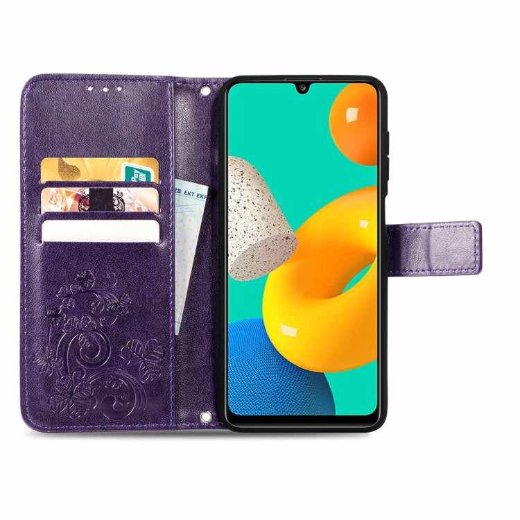 For Samsung Galaxy M32 Four-leaf Clasp Embossed Buckle Mobile Phone Protection Leather Case with Lanyard & Card Slot & Wallet & Bracket Function