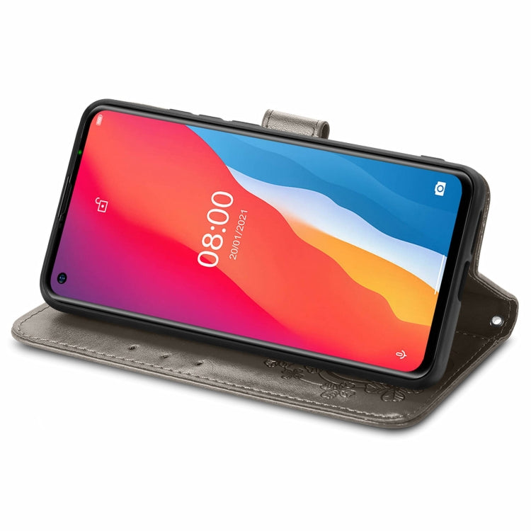 For Ulefone Note 11 Plus Four-leaf Clasp Embossed Buckle Mobile Phone Protection Leather Case with Lanyard & Card Slot & Wallet & Bracket Function