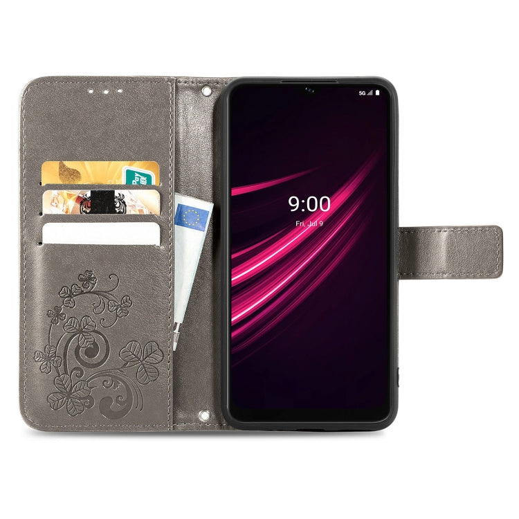 For T-Mobile REVVL V+ 5G Four-leaf Clasp Embossed Buckle Mobile Phone Protection Leather Case with Lanyard & Card Slot & Wallet & Bracket Function