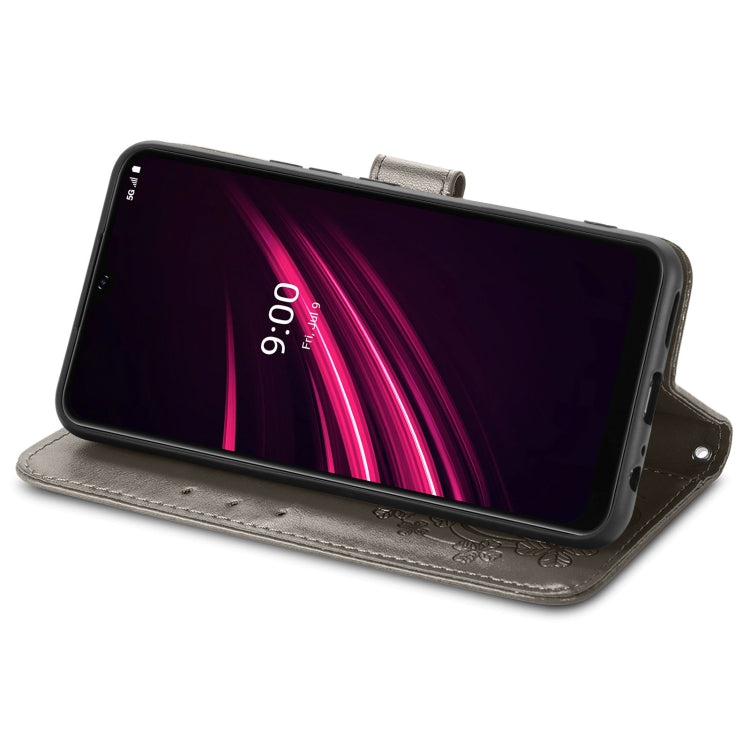 For T-Mobile REVVL V+ 5G Four-leaf Clasp Embossed Buckle Mobile Phone Protection Leather Case with Lanyard & Card Slot & Wallet & Bracket Function