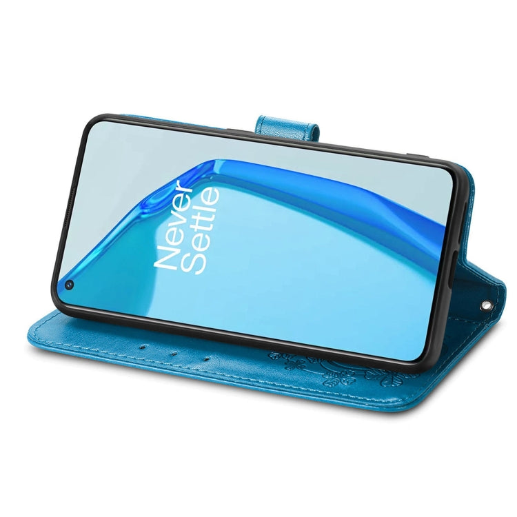 For OnePlus 9R Four-leaf Clasp Embossed Buckle Mobile Phone Protection Leather Case with Lanyard & Card Slot & Wallet & Bracket Function