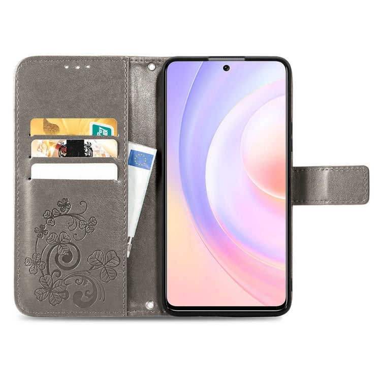 For Honor 50 SE Four-leaf Clasp Embossed Buckle Mobile Phone Protection Leather Case with Lanyard & Card Slot & Wallet & Bracket Function