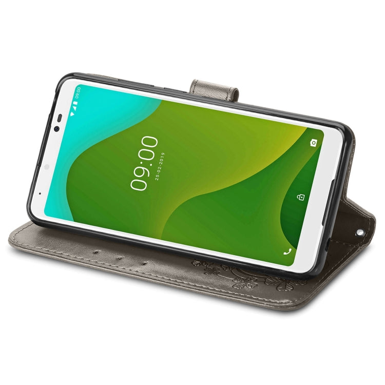 For Wiko Jerry 4 Four-leaf Clasp Embossed Buckle Mobile Phone Protection Leather Case with Lanyard & Card Slot & Wallet & Bracket Function
