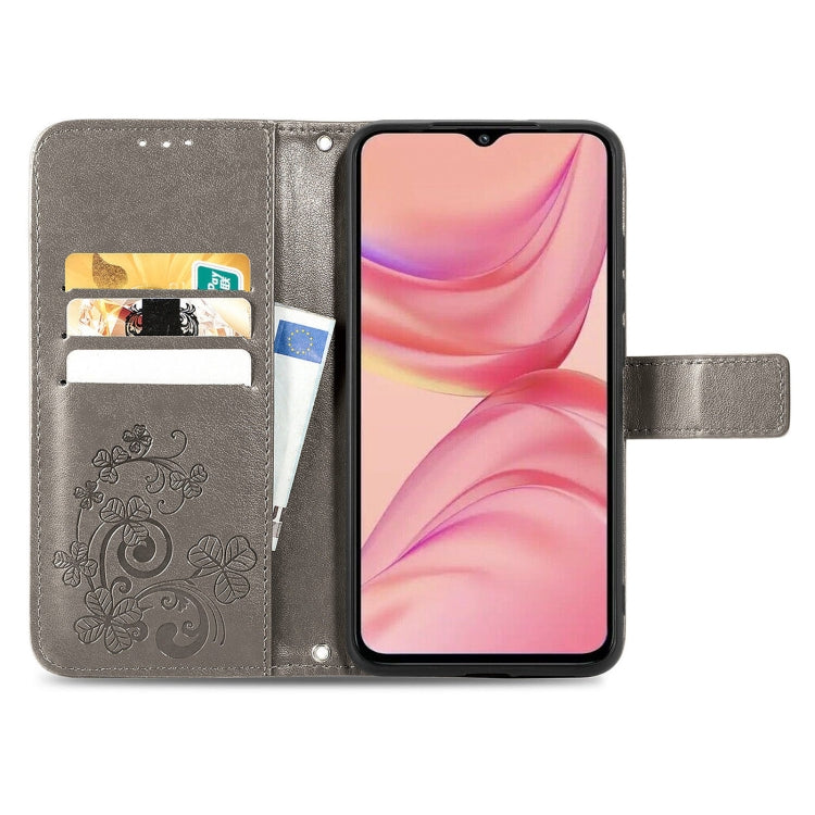 For Infinix Hot 10 Lite Four-leaf Clasp Embossed Buckle Mobile Phone Protection Leather Case with Lanyard & Card Slot & Wallet & Bracket Function