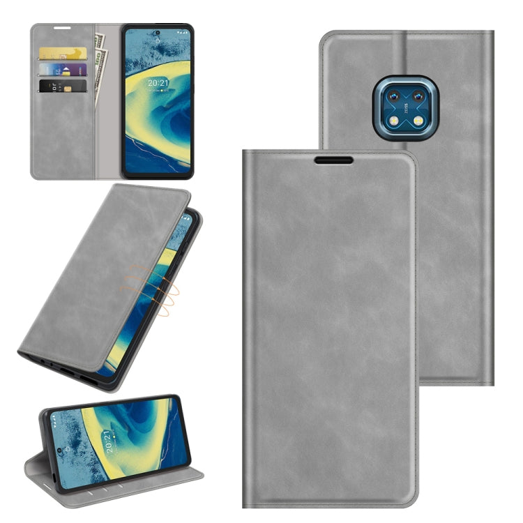 For Nokia XR20 Retro-skin Business Magnetic Suction Leather Case with Holder & Card Slots & Wallet