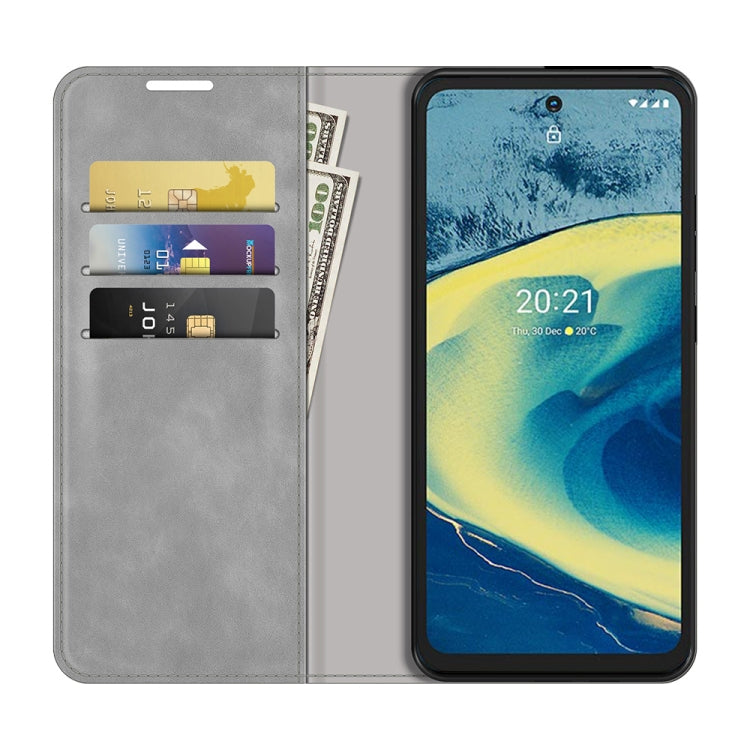 For Nokia XR20 Retro-skin Business Magnetic Suction Leather Case with Holder & Card Slots & Wallet
