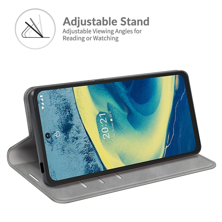 For Nokia XR20 Retro-skin Business Magnetic Suction Leather Case with Holder & Card Slots & Wallet
